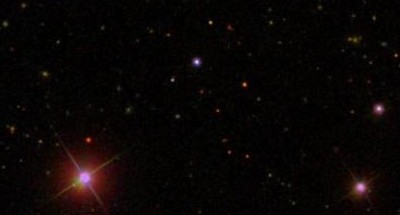 Para bailar se necesitan dos: Fusión poco común de dos galaxias enanas observada en un vacío cósmico